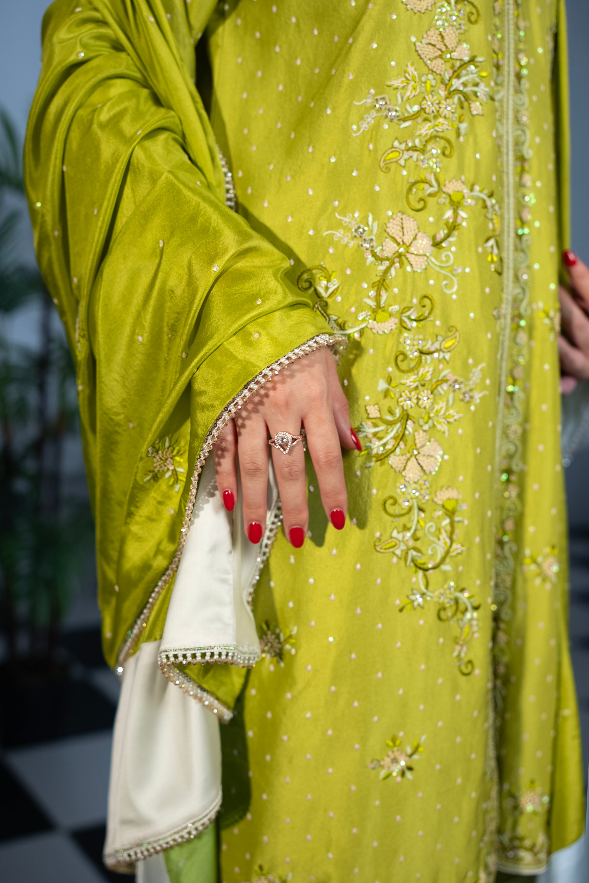 Hand-embroidered vertical panel detailing on Citrus Sorbet Pakistani designer suit, sequins and beadwork
