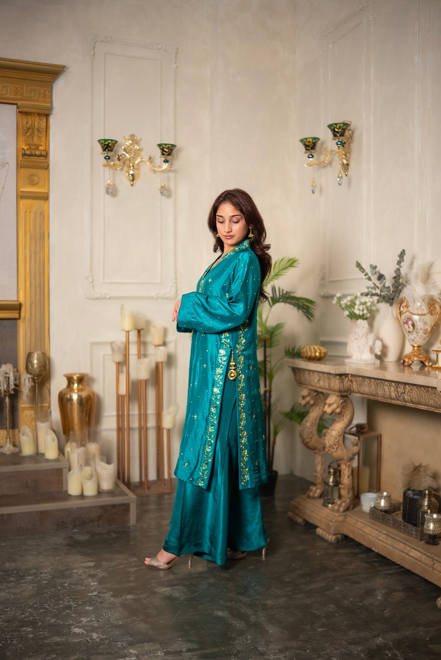 Close-up of Emerald Veil hand embroidered crystal beadwork suit sleeve detailing