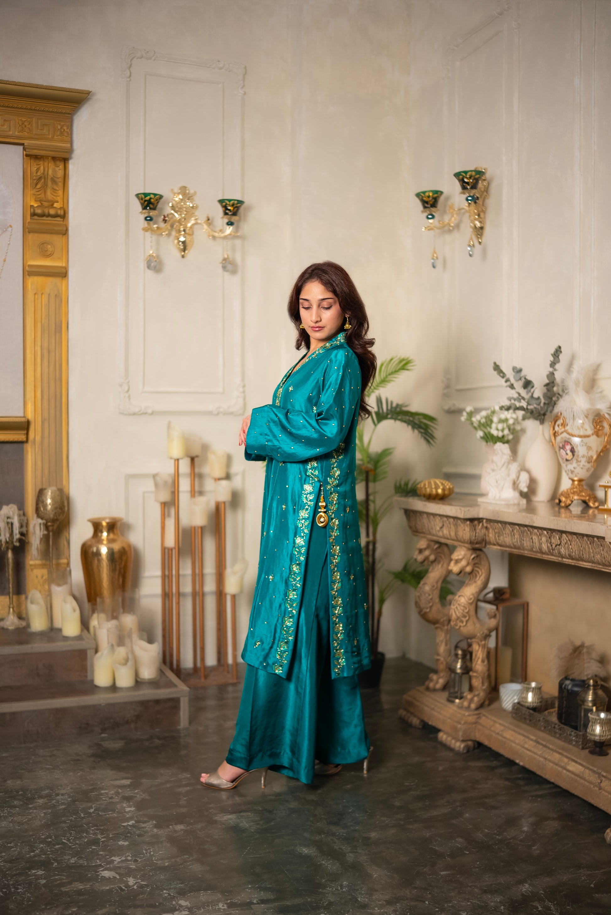 Close-up of Emerald Veil hand embroidered crystal beadwork suit sleeve detailing