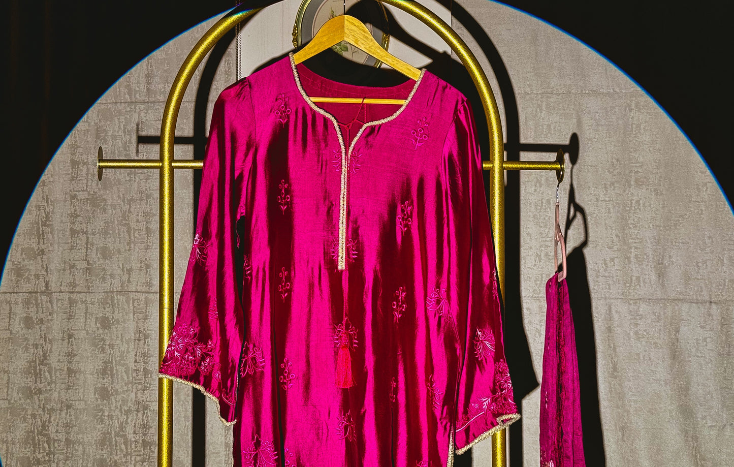 Fuchsia floral embroidered Pakistani suit with cream beaded detailing