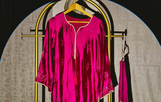 Fuchsia floral embroidered Pakistani suit with cream beaded detailing