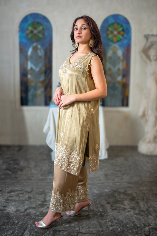 beige embroidered Pakistani suit with crystal detailing