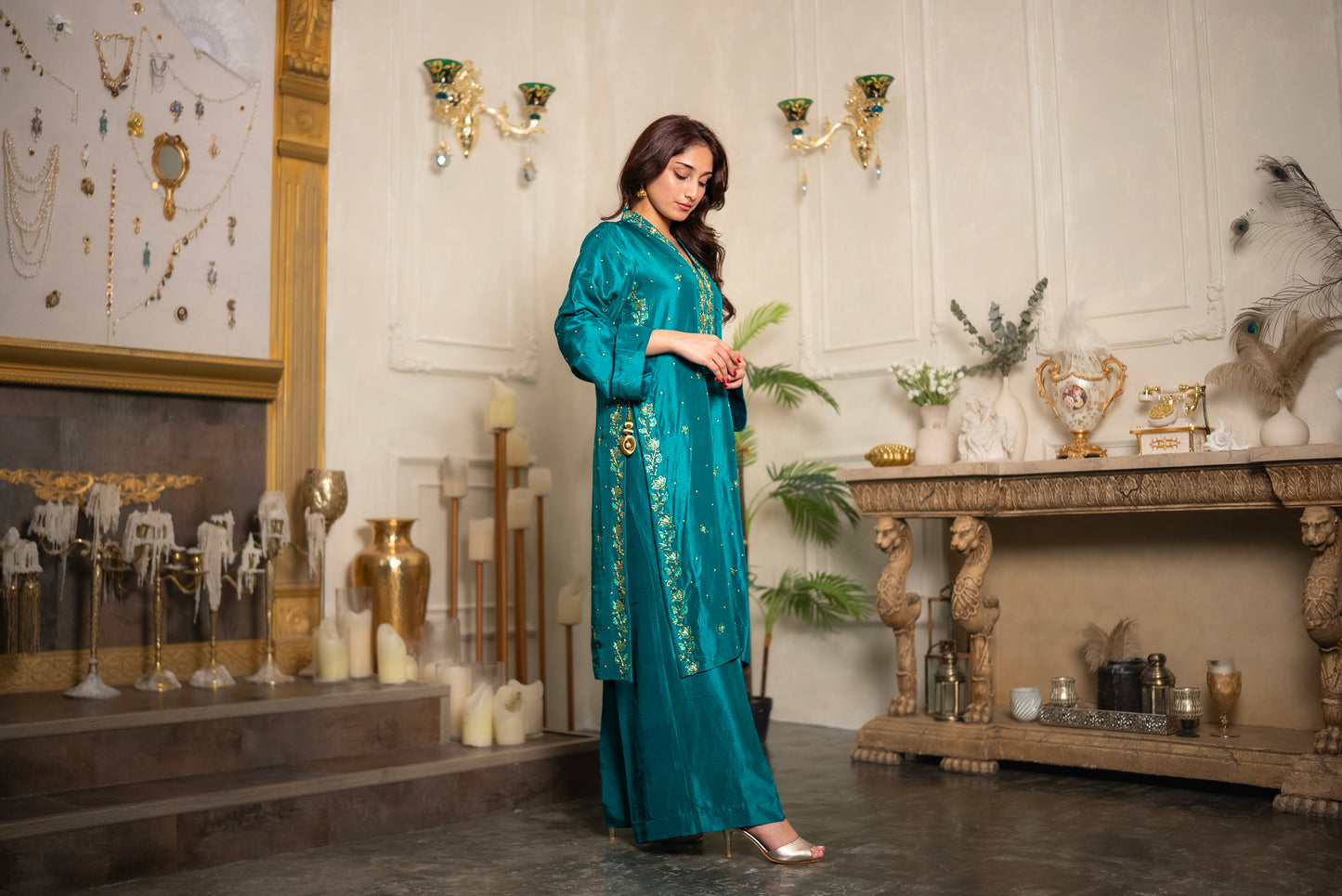 Woman wearing Emerald Veil hand embroidered crystal beadwork suit with crystal-embellished dupatta, UAE