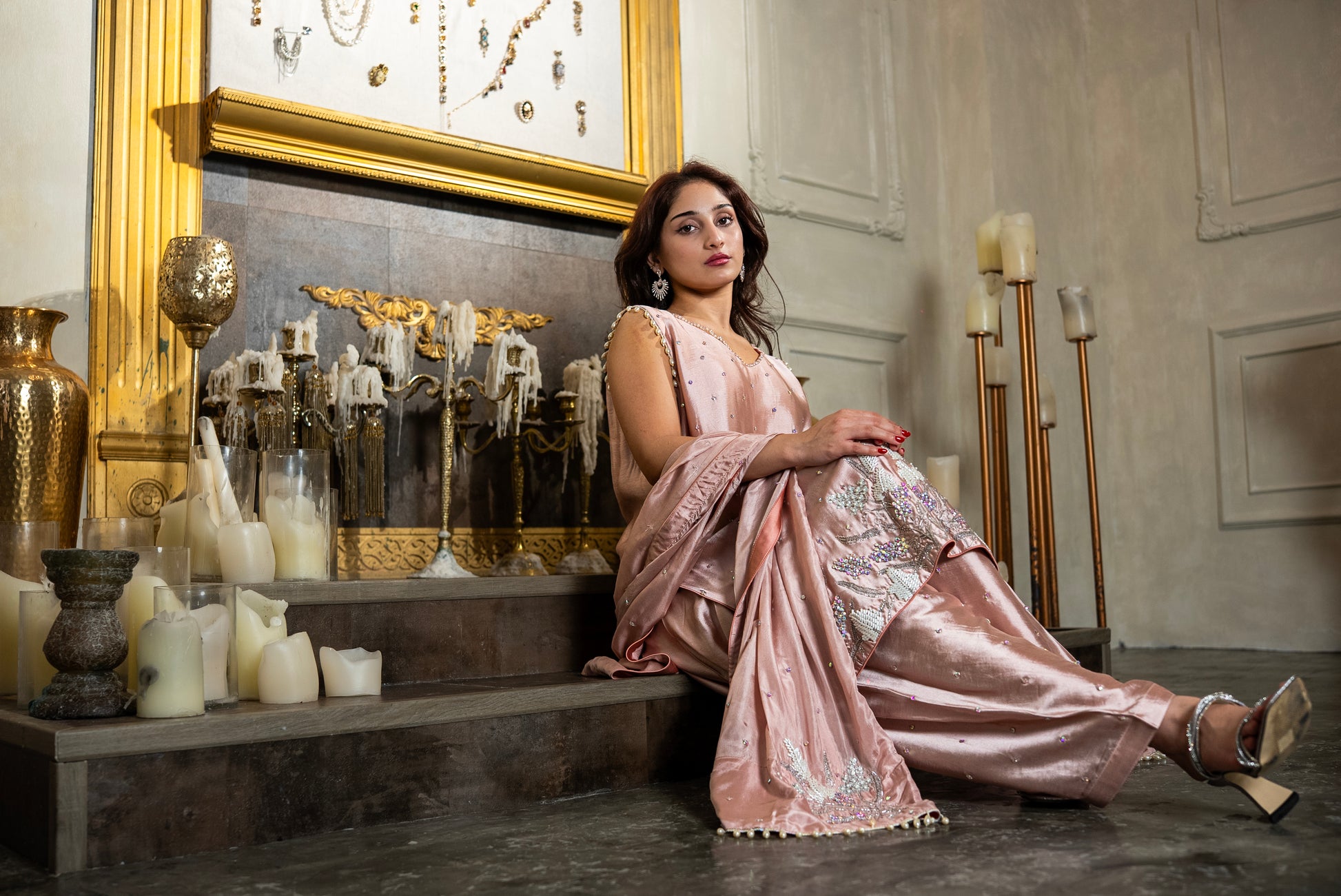 Woman wearing Rosewater pink tissue silk Pakistani suit with matching dupatta, luxury Pakistani wear UAE