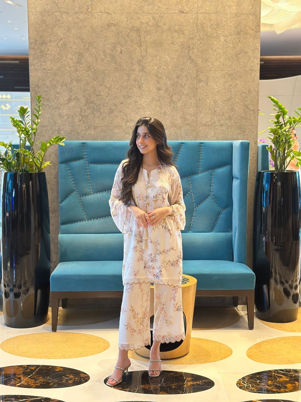 Ivory Pakistani suit with blush pink and violet velvet floral detailing