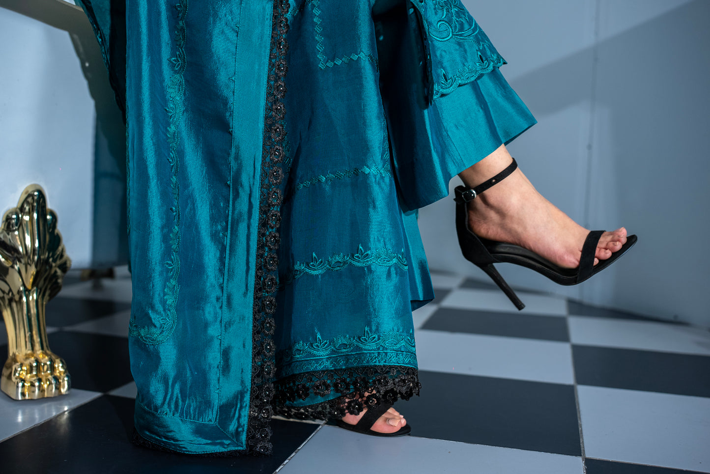 Close-up of Verdant Grace dark green tissue silk suit kurta embroidery and subtle cutwork