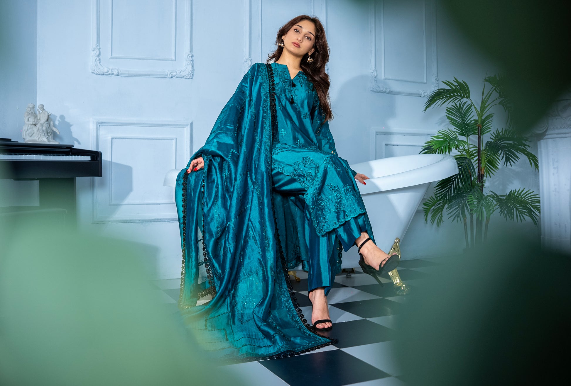 Close-up of Verdant Grace dark green tissue silk suit kurta embroidery and subtle cutwork